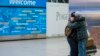 Abdullah Alghazali, right, hugs his 13-year-old son Ali Abdullah Alghazali after the Yemeni boy stepped out of an arrival entrance at John F. Kennedy International Airport in New York, Feb. 5, 2017.